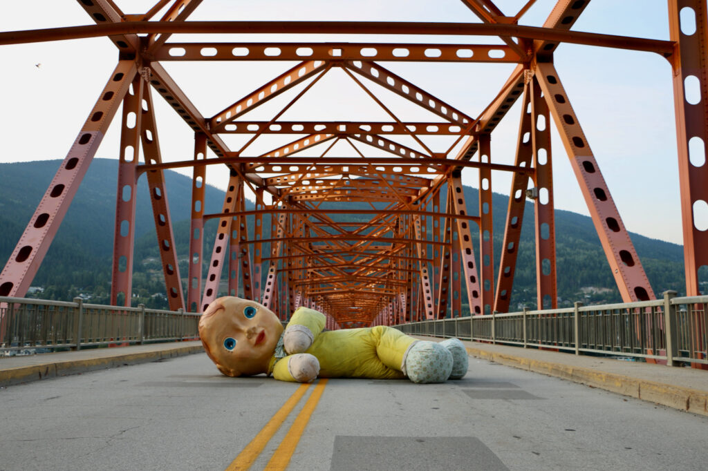 Field Doll - Big Orange Bridge, Nelson, BC